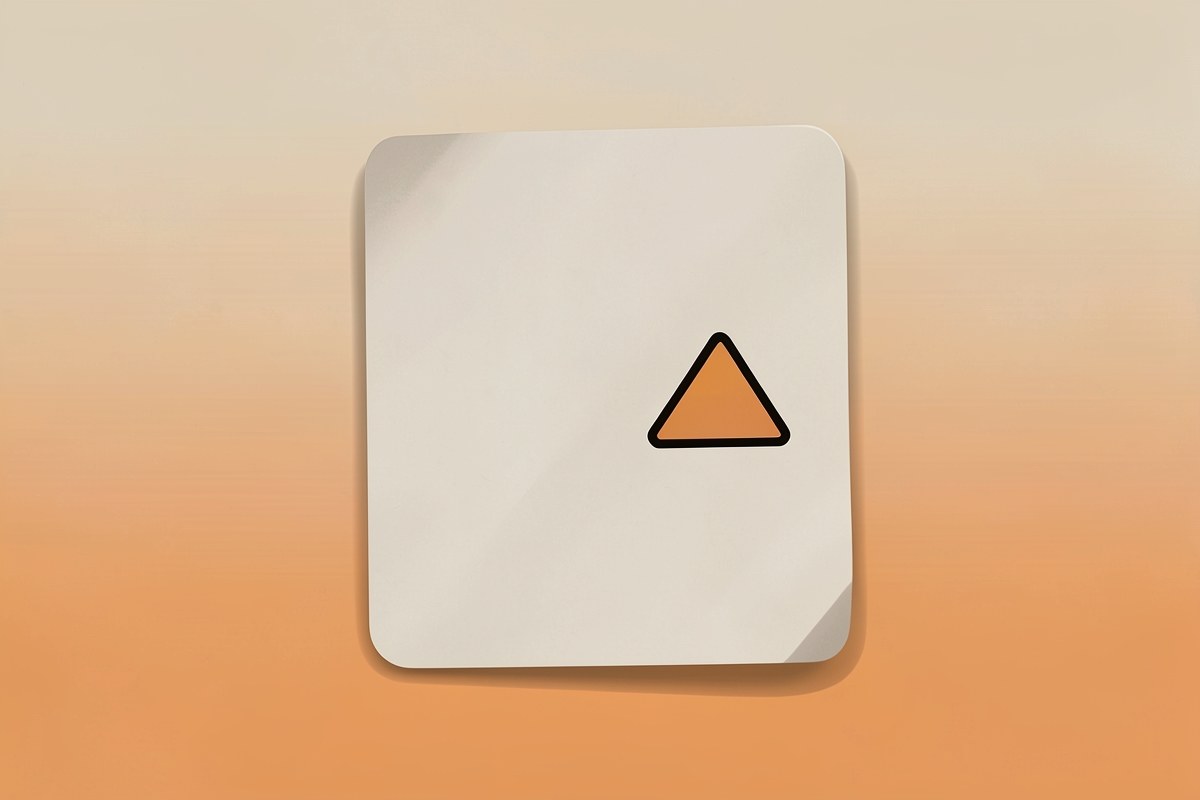 A warning icon on a piece of paper, symbolizing a disclaimer.